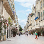 Angers, France - July 28, 2014: Apeople on street Rue Lenepveu in Angers, France. Angers is city in western France and it is the historical capital of the province of Anjou