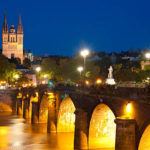 Cityscape of Angers at a dark summer night